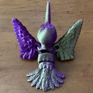 Purple and Green Bird Figurine